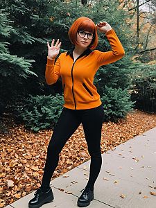 Young Woman with Orange Hair in Autumn