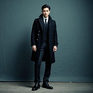 Elegant Man in Black Long Coat and Formal Suit Full Body Portrait