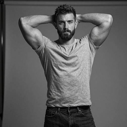 Black and White Portrait of Confident Muscular Man in Casual Wear