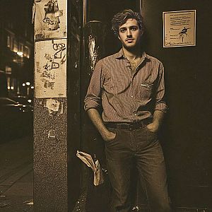 Stylish Young Man in Casual Vintage Outfit