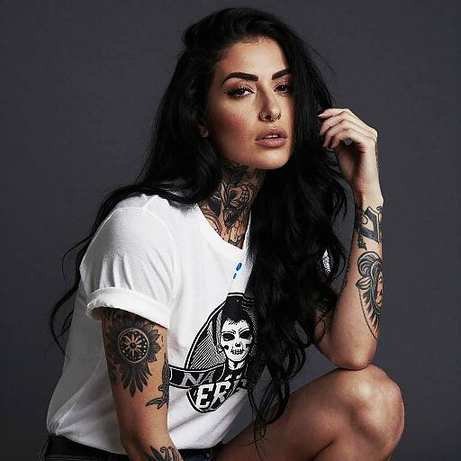 Edgy Tattooed Woman with Black Hair and Graphic T-Shirt