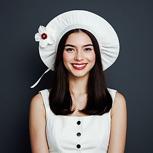 Young Woman in White Dress and Hat